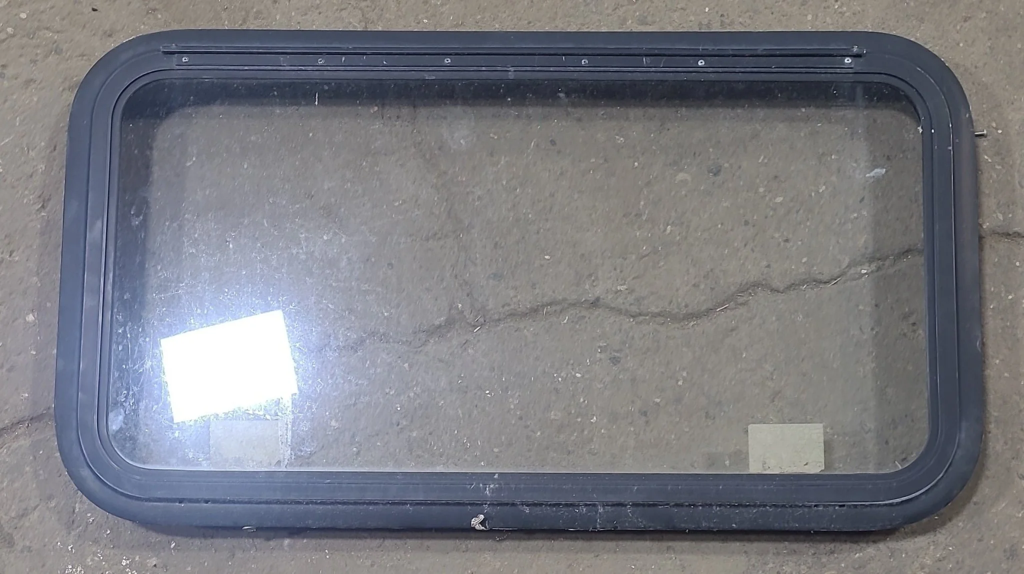 Used Black Radius Emergency Opening Window : 35 1/2" W X 18 3/4" H X 1 3/4" D