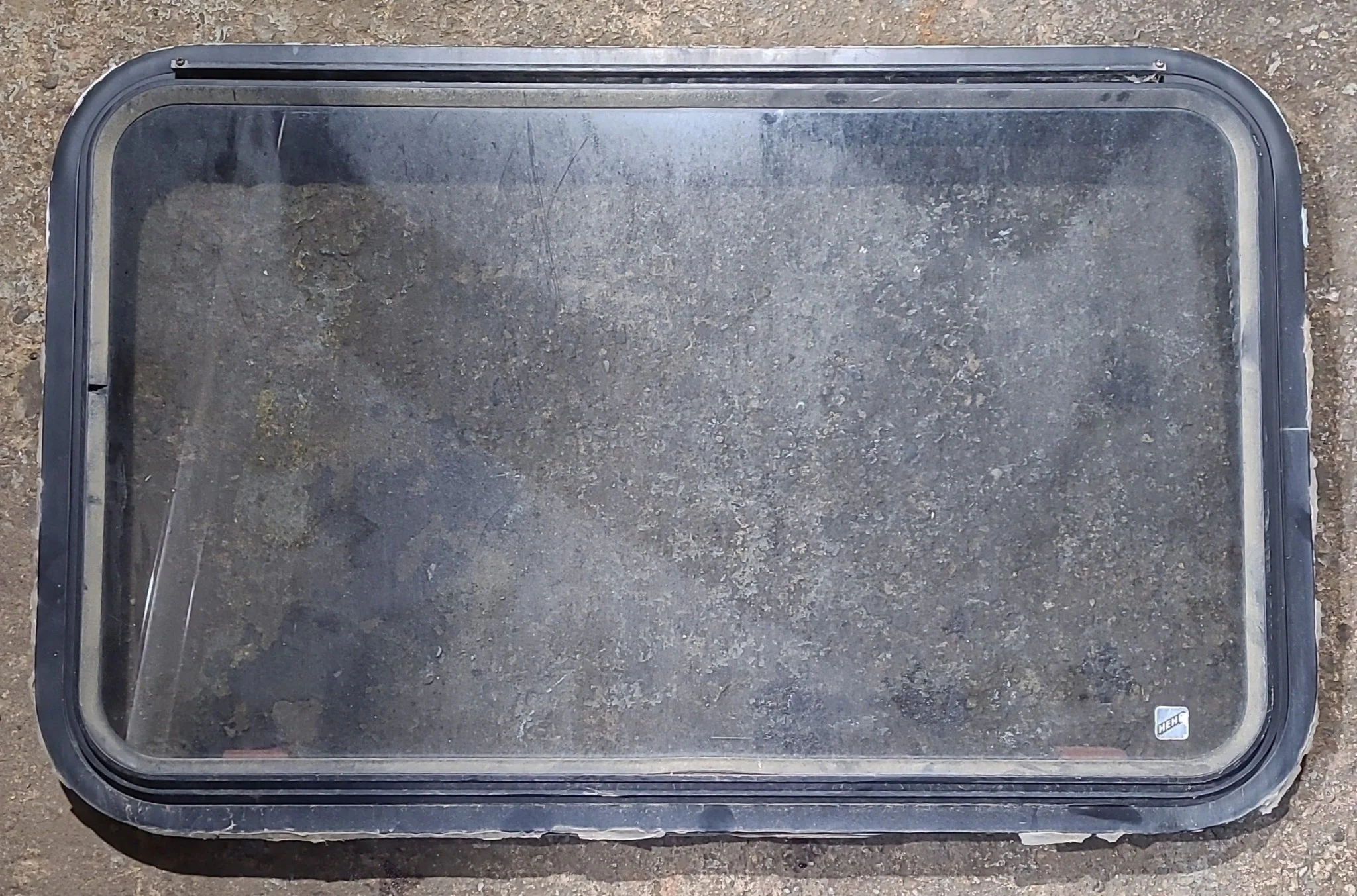 Used Black Radius Emergency Opening Window : 35 1/2" W x 21 3/4" H x 1 5/8" D