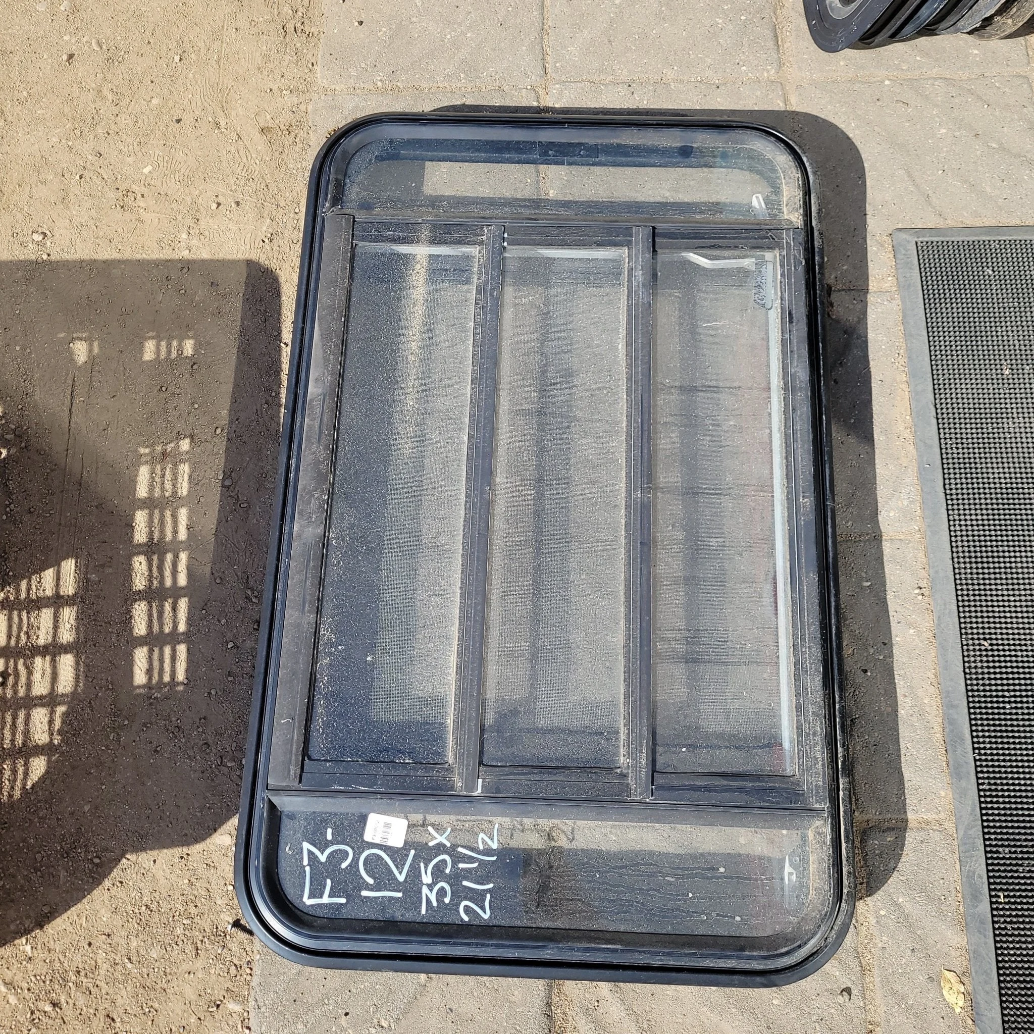 Used Black Radius Emergency Opening Window : 35 X 21 1/2 X 2" D