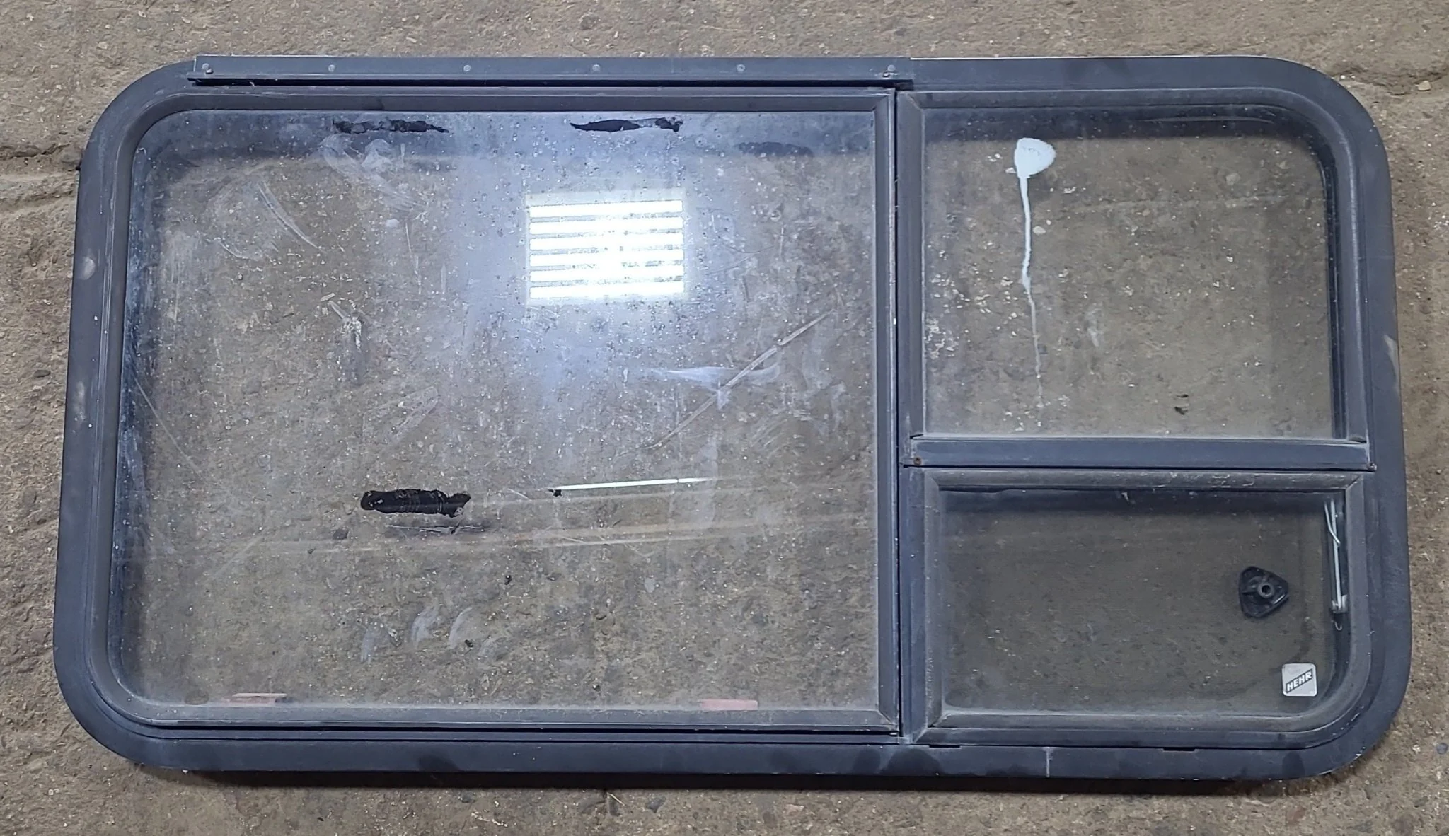 Used Black Radius Emergency Opening Window : 41 3/8" W x 21 5/8" H x 1 7/8" D